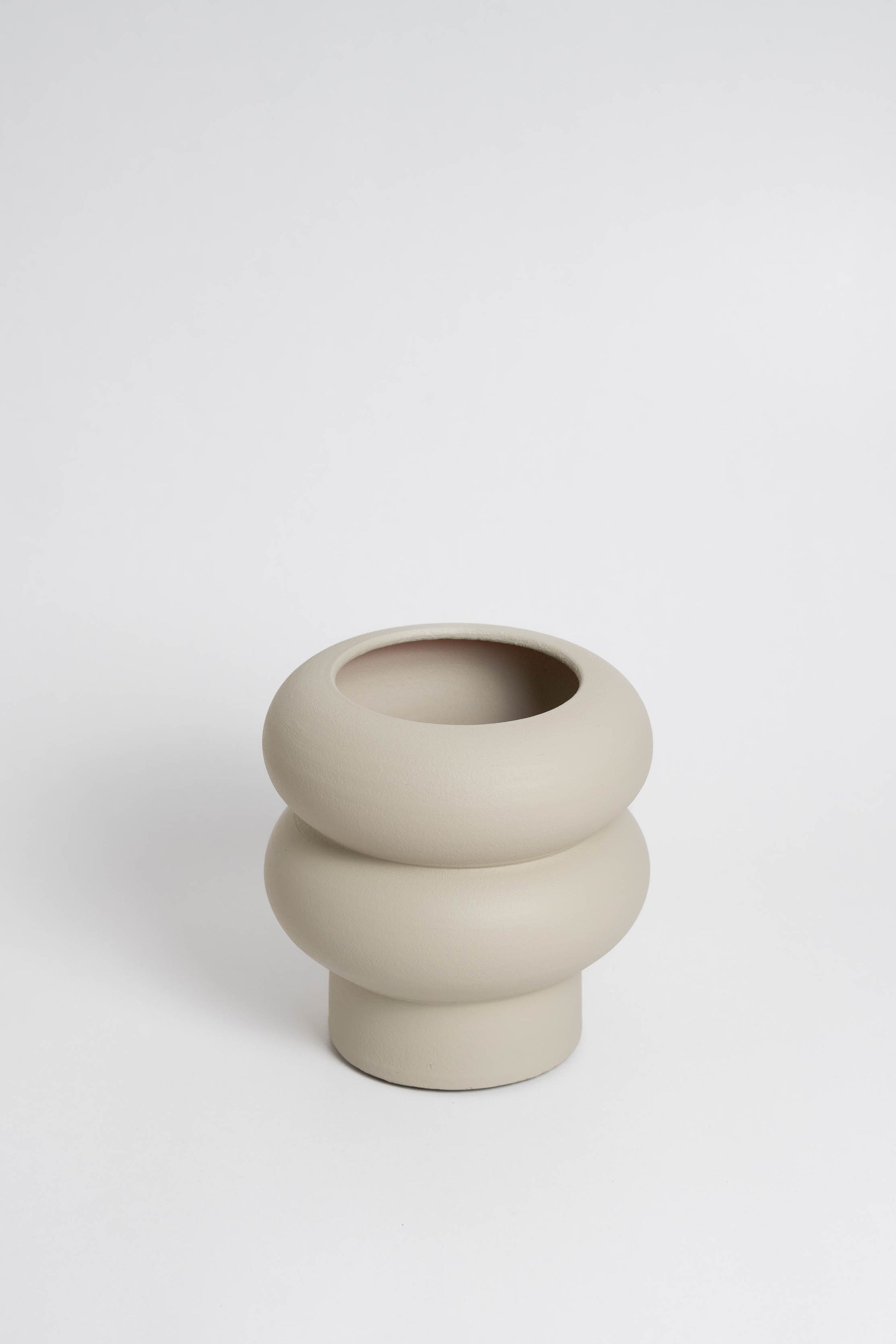 Off white ceramic with a minimalist design, handmade in Portugal. Ideal for displaying flowers or as a standalone decorative vase.