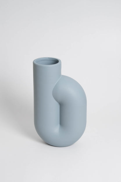 Nono light blue, ceramic with a minimalist design, handmade in Portugal. Ideal for displaying flowers or as a standalone decorative vase.