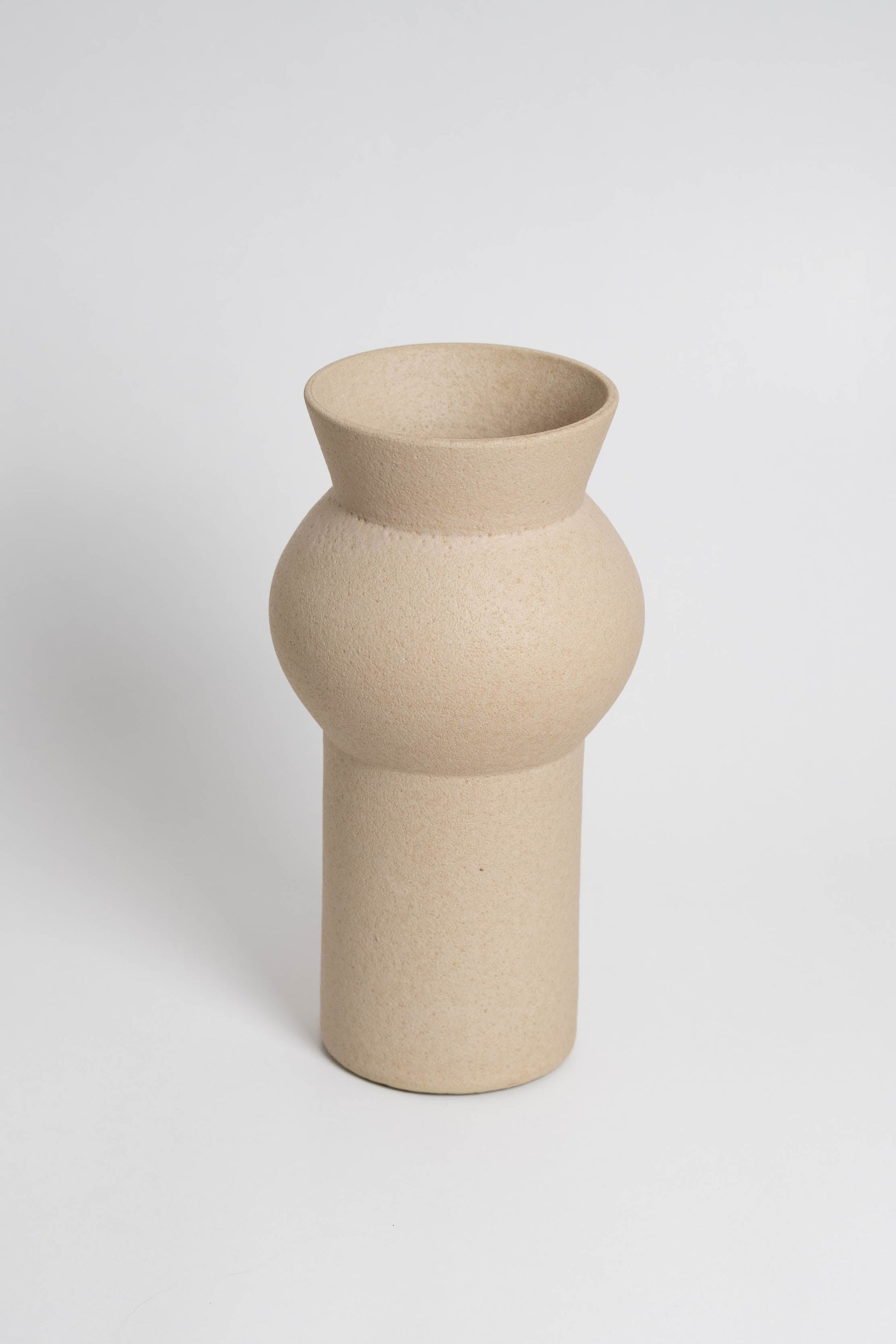 Noachis in cream, ceramic vase with a textured, earthy surface, handmade in Portugal. Perfect for displaying flowers or as a unique decorative vase in modern interiors.