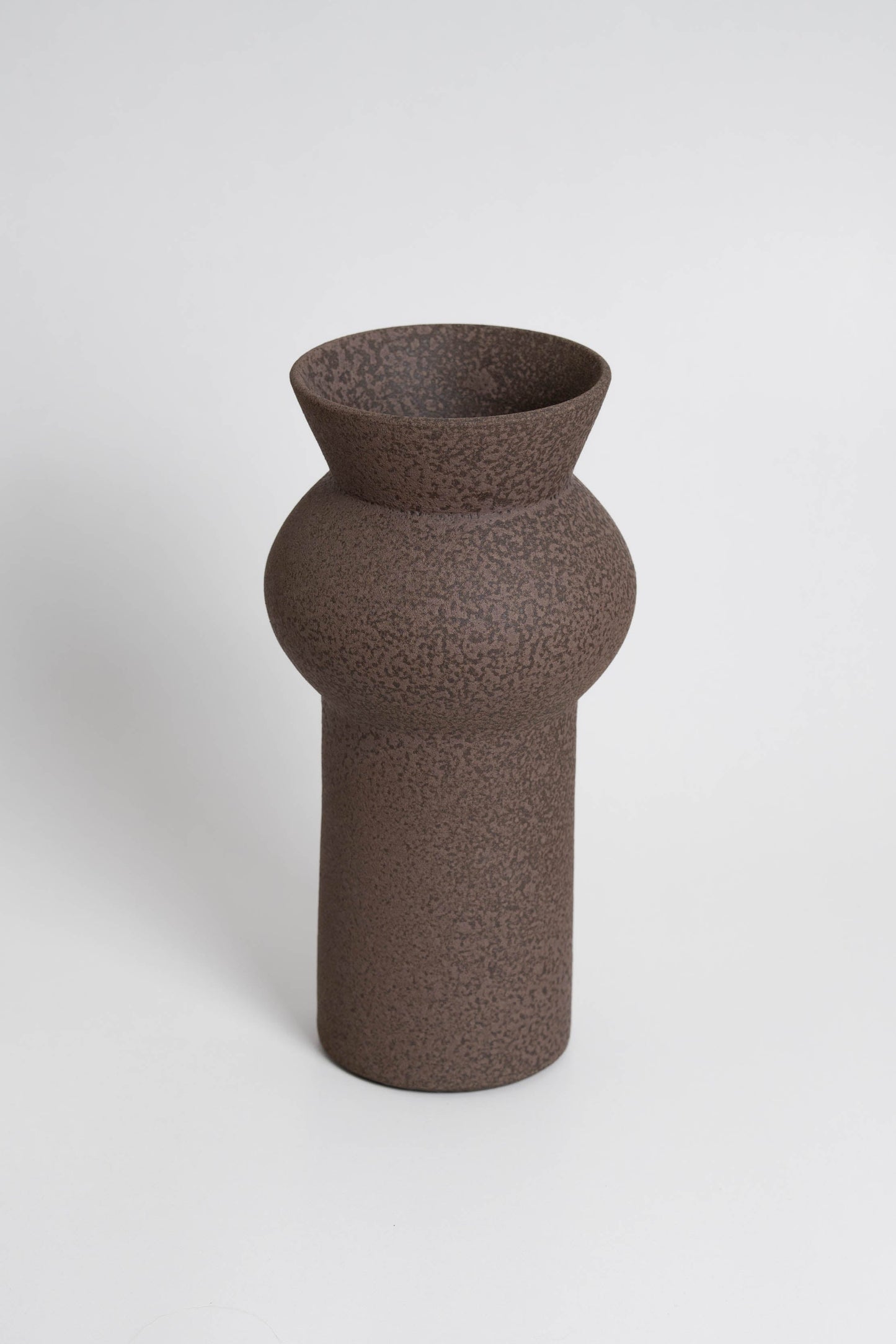 Noachis in brown, ceramic vase with a textured, earthy surface, handmade in Portugal. Perfect for displaying flowers or as a unique decorative vase in modern interiors.