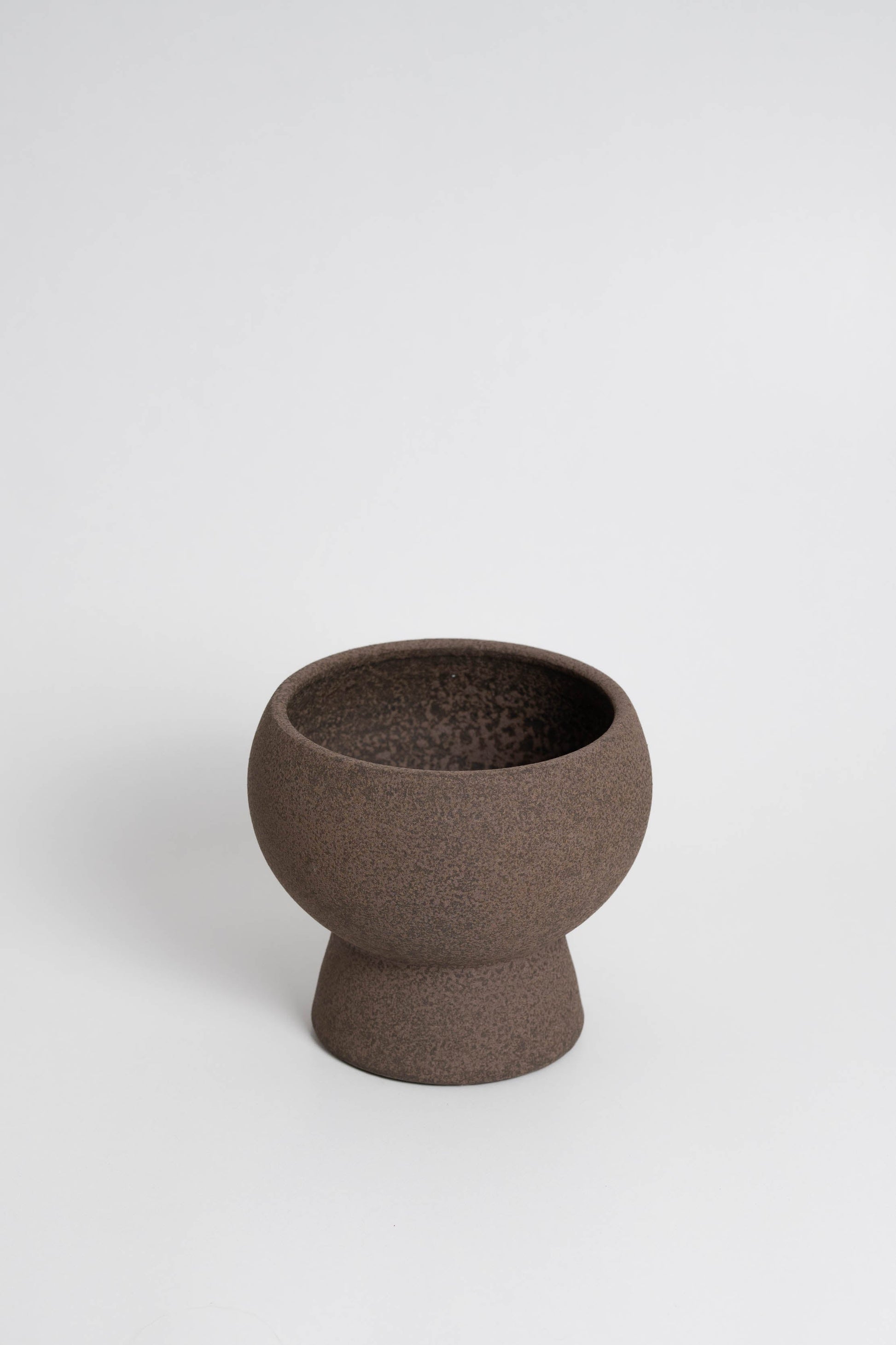 Holden in brown, ceramic vase with a textured, earthy surface, handmade in Portugal. Perfect for displaying flowers or as a unique decorative vase in modern interiors.