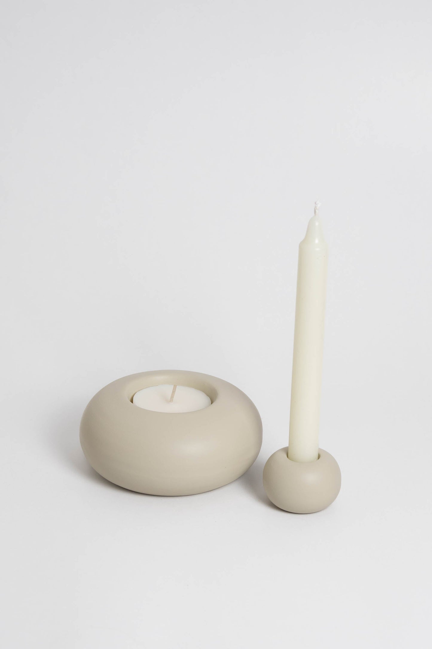 Duo Modular candle holder in off white , consisting of two individual pieces that can be arranged together or separately, providing customizable decoration options. Handmade in Portugal
