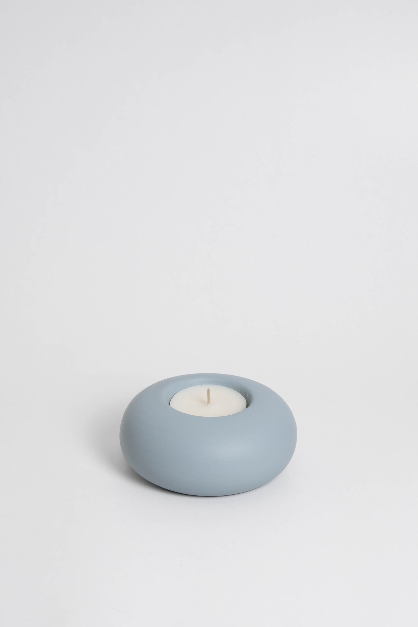 Duo Modular candle holder in light blue, consisting of two individual pieces that can be arranged together or separately, providing customizable decoration options. Handmade in Portugal
