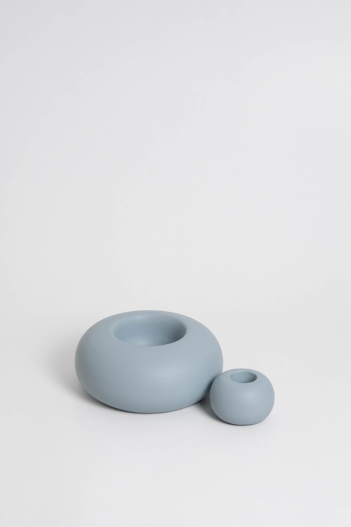 Duo Modular candle holder in light blue, consisting of two individual pieces that can be arranged together or separately, providing customizable decoration options. Handmade in Portugal
