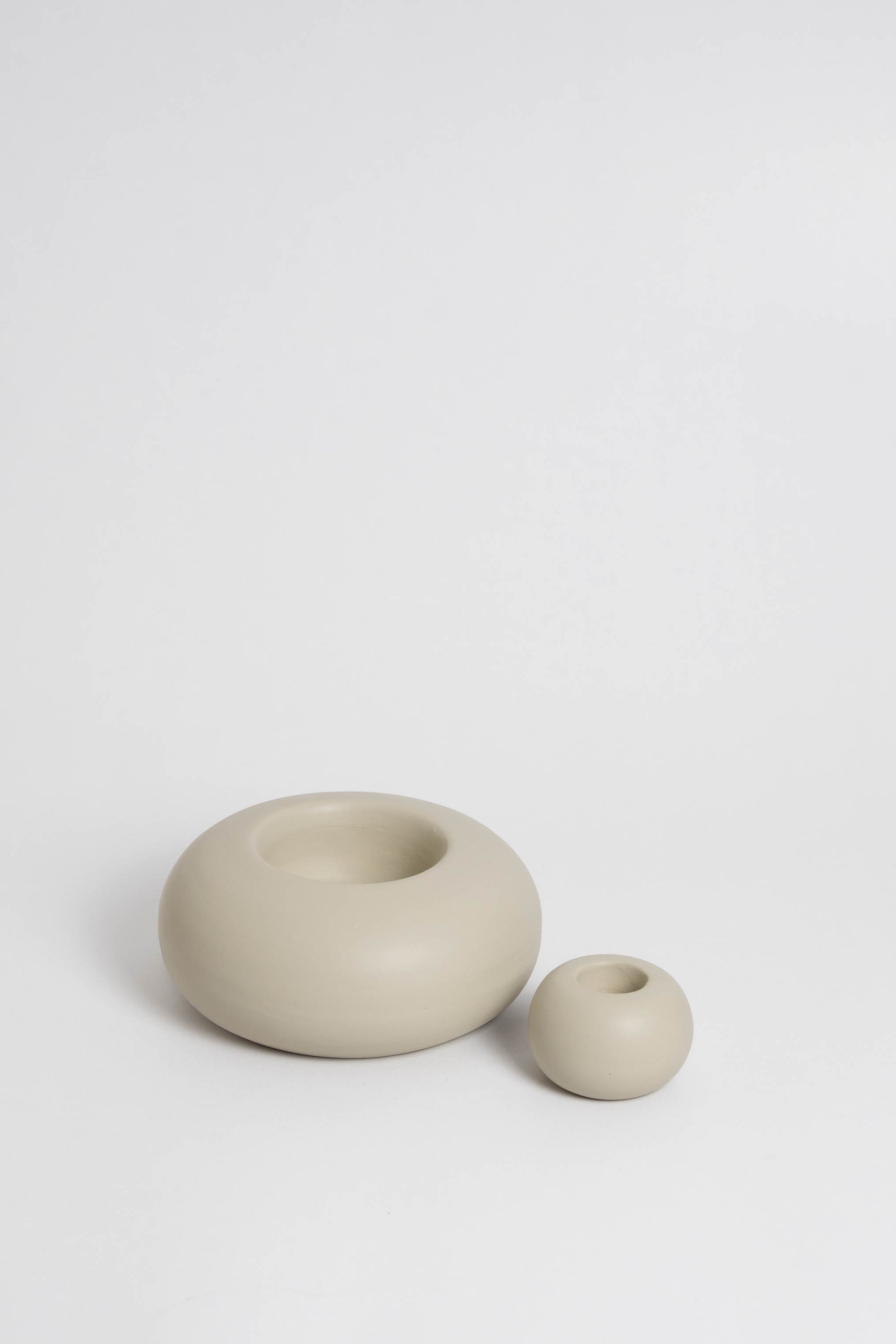 Duo Modular candle holder in off white, consisting of two individual pieces that can be arranged together or separately, providing customizable decoration options. Handmade in Portugal
