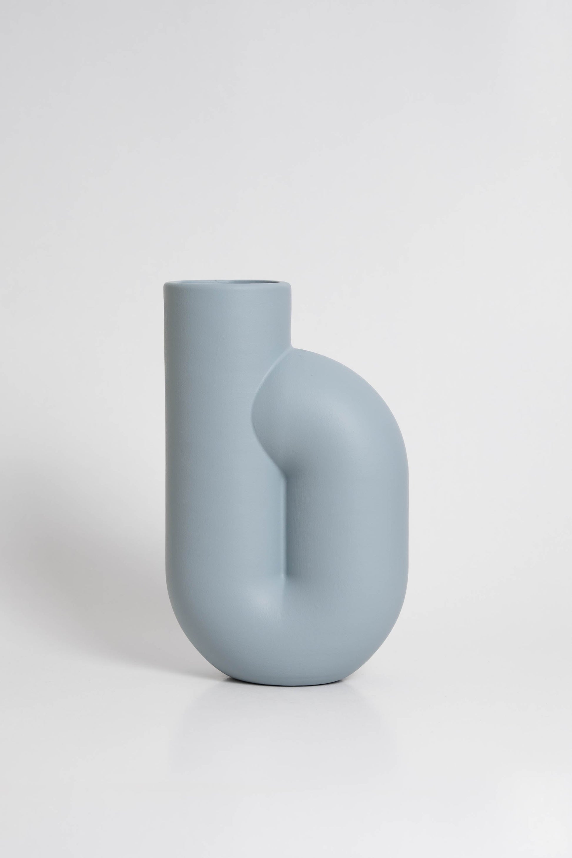 Nono Vase in light bluee ceramic with a minimalist design, handmade in Portugal. Ideal for displaying flowers or as a standalone decorative vase.