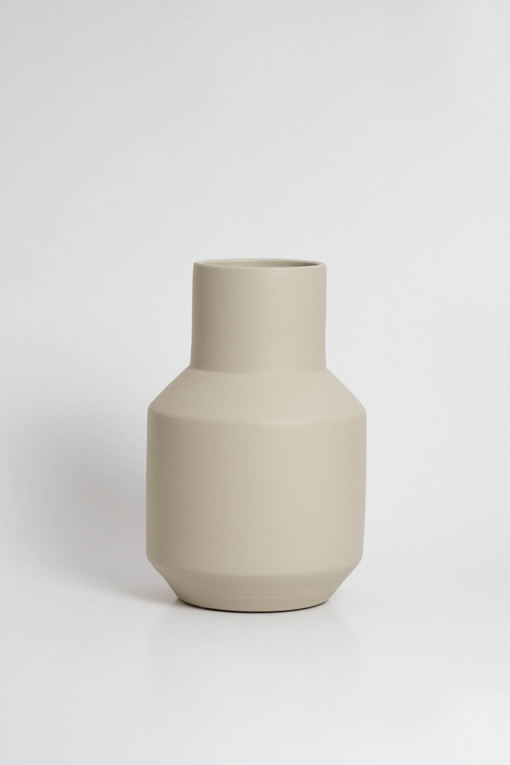 Sado Vase in off white ceramic with a minimalist design, handmade in Portugal. Ideal for displaying flowers or as a standalone decorative vase.