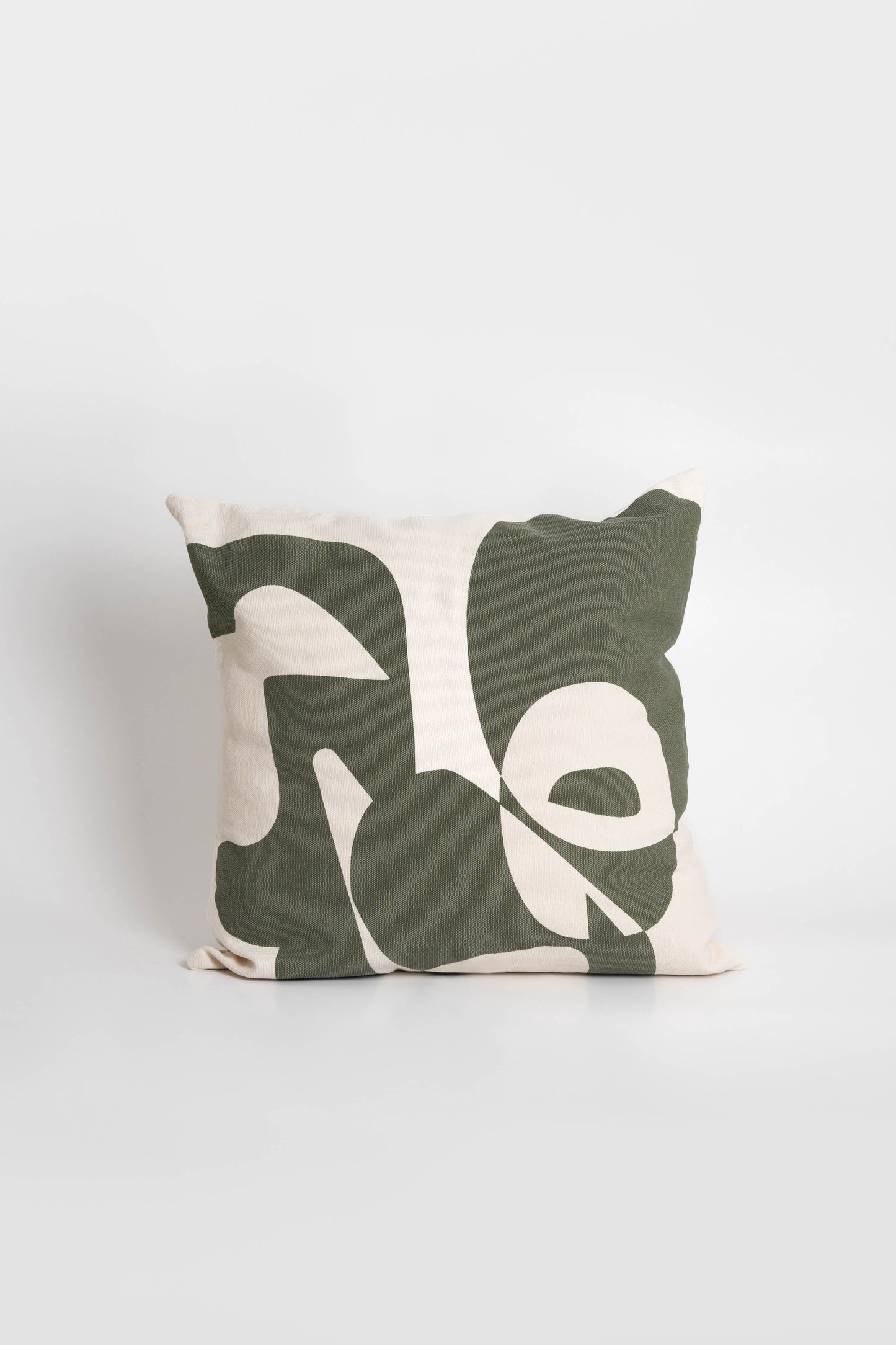 Cotton cushion cover with a vibrant green print, adding a stylish and colorful touch to any sofa or bed. Made in Portugal