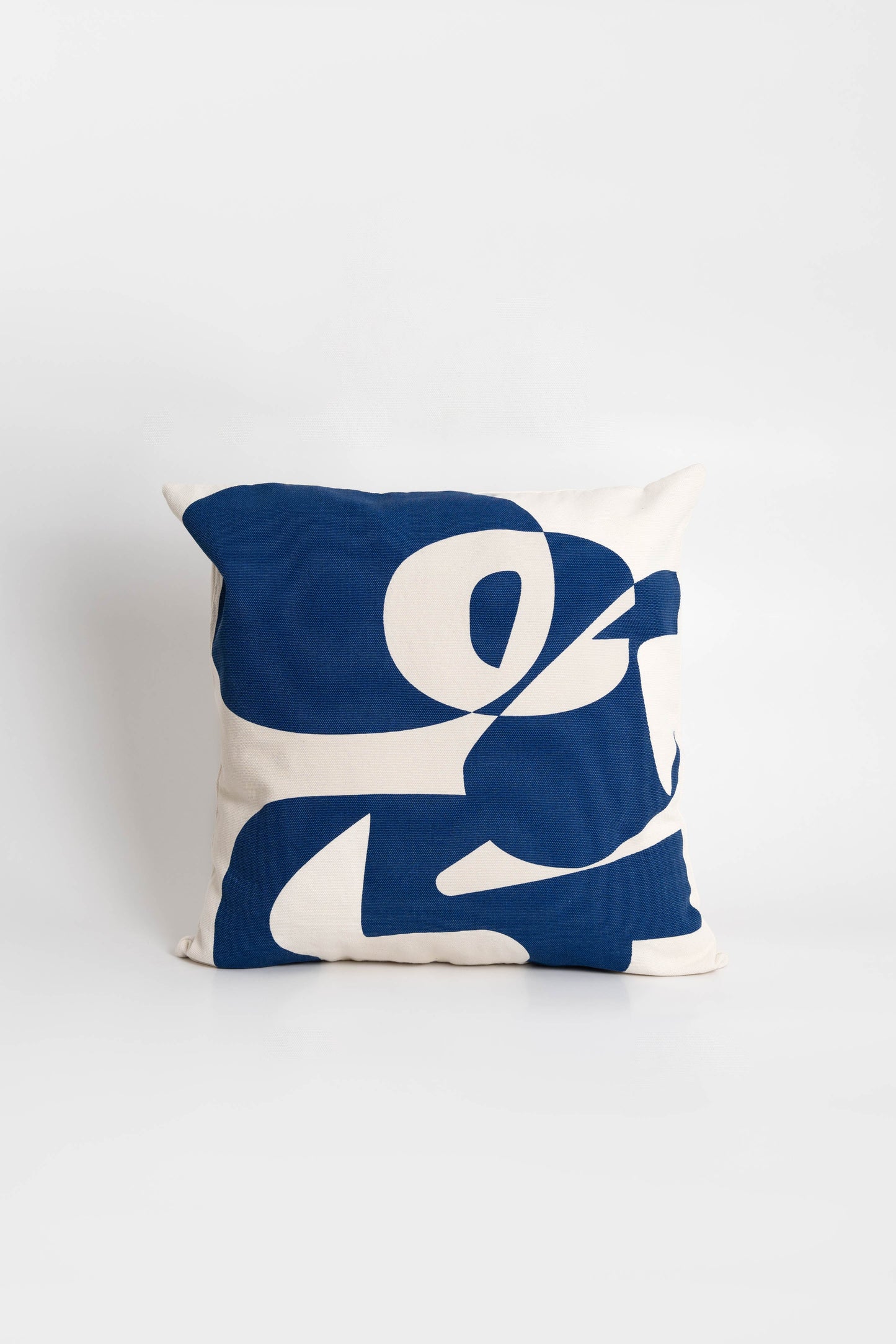 Cotton cushion cover with a vibrant blue print, adding a stylish and colorful touch to any sofa or bed. Made in Portugal