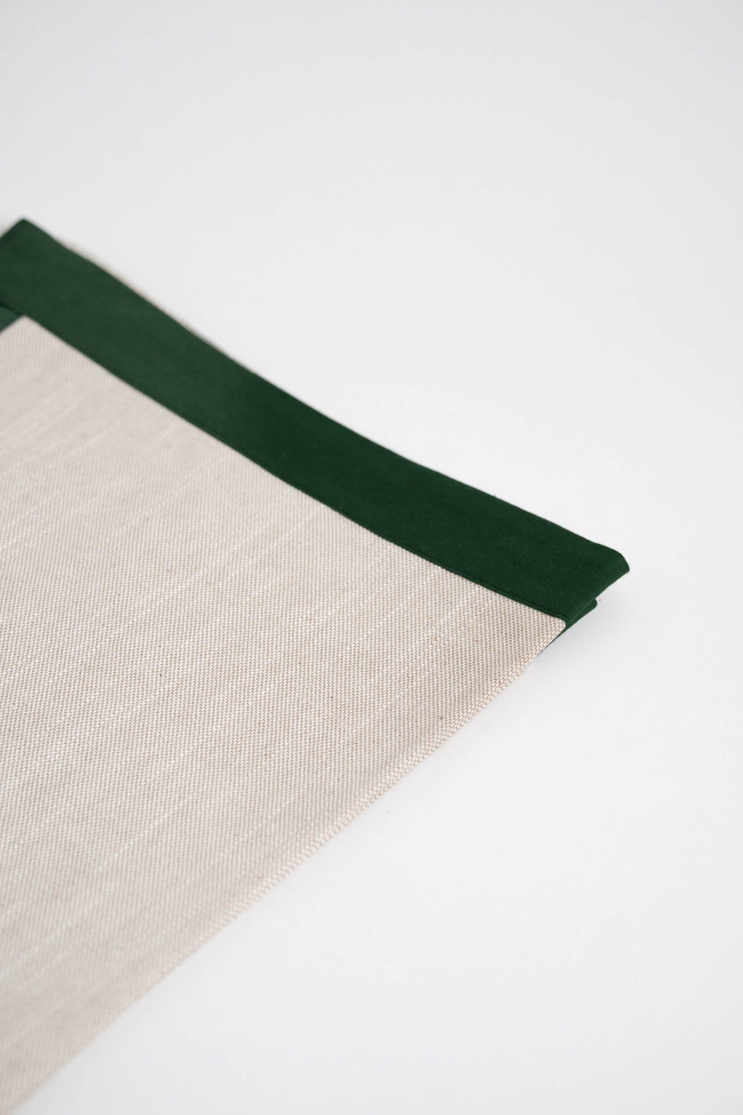 Soft and eco-friendly home textile made from cotton, made in Portugal. Features green border detail. Perfect for table decor.