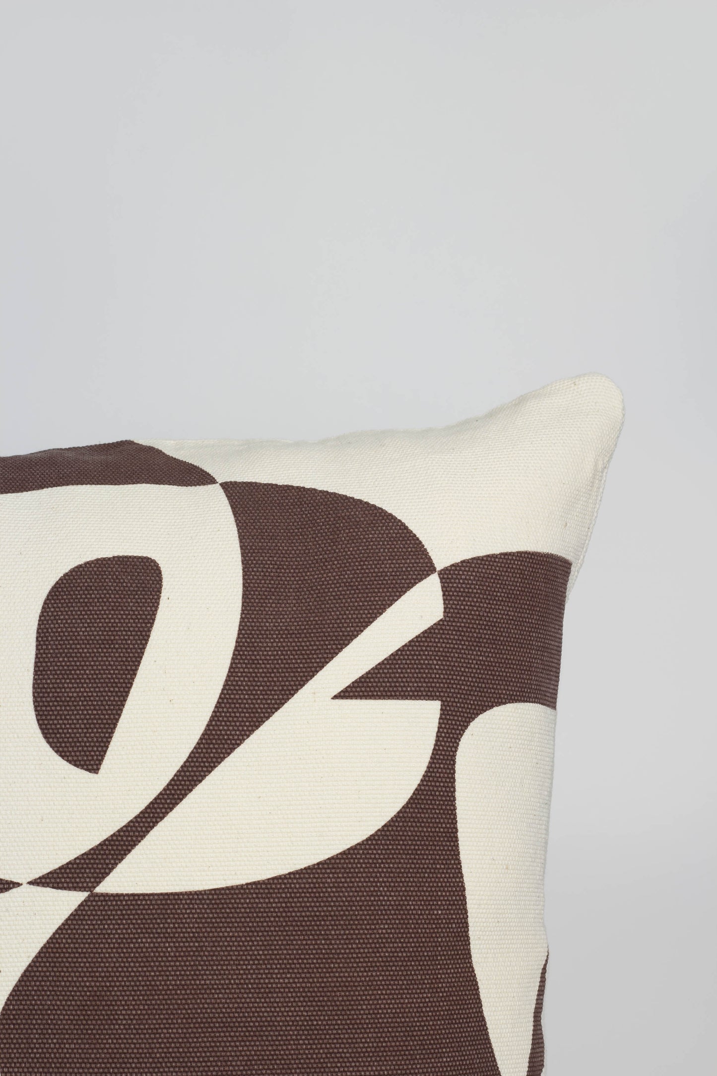 Cotton cushion cover with a vibrant brown print, adding a stylish and colorful touch to any sofa or bed. Made in Portugal