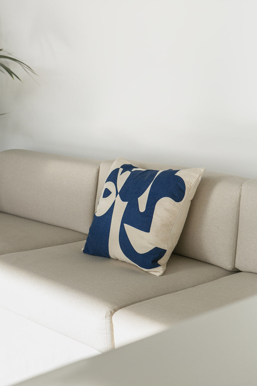 Cotton cushion cover with a vibrant blue print, adding a stylish and colorful touch to any sofa or bed. Made in Portugal