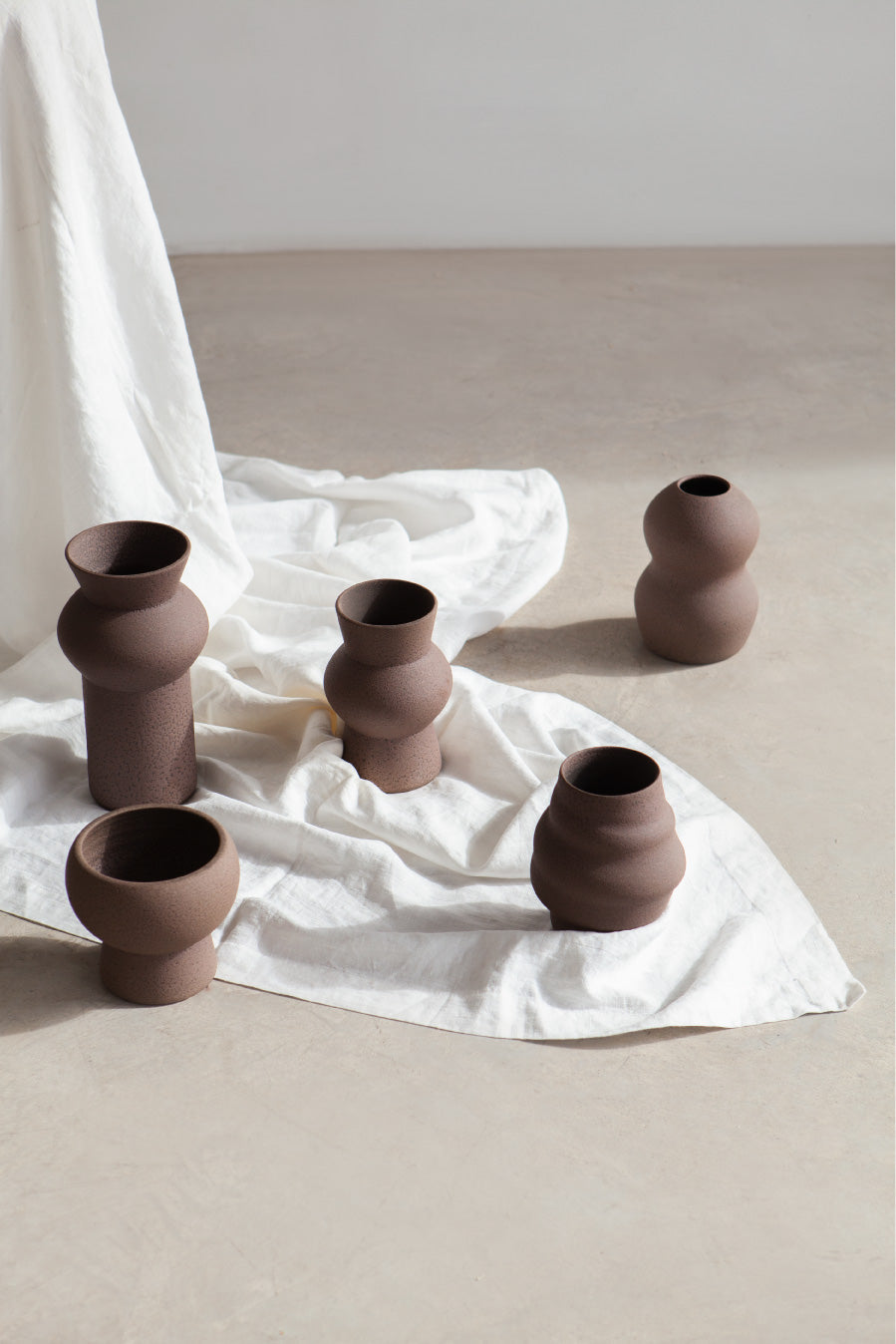 decorative vases, minimalist design inspired by the beauty of volcanic textures. It's durable, sustainable and handmade in Portugal.