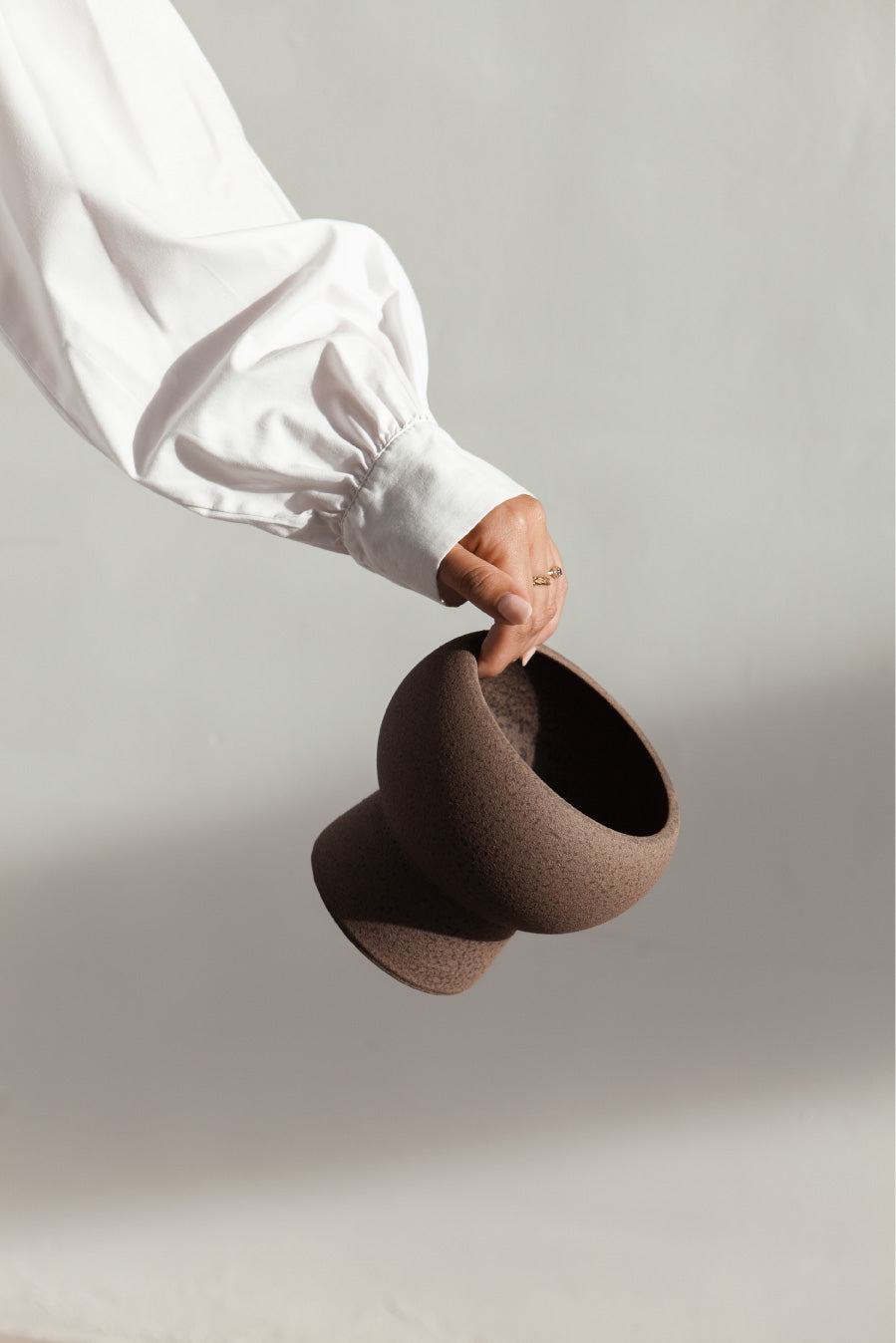 Holden in brown, ceramic vase with a textured, earthy surface, handmade in Portugal. Perfect for displaying flowers or as a unique decorative vase in modern interiors.