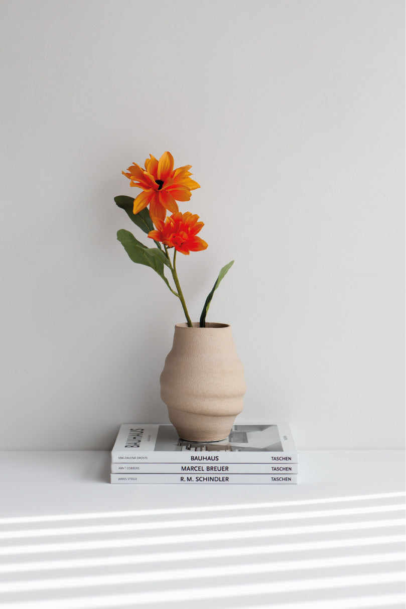 Aonia in cream, decorative vase, minimalist design inspired by the beauty of volcanic textures. It's durable, sustainable and handmade in Portugal.