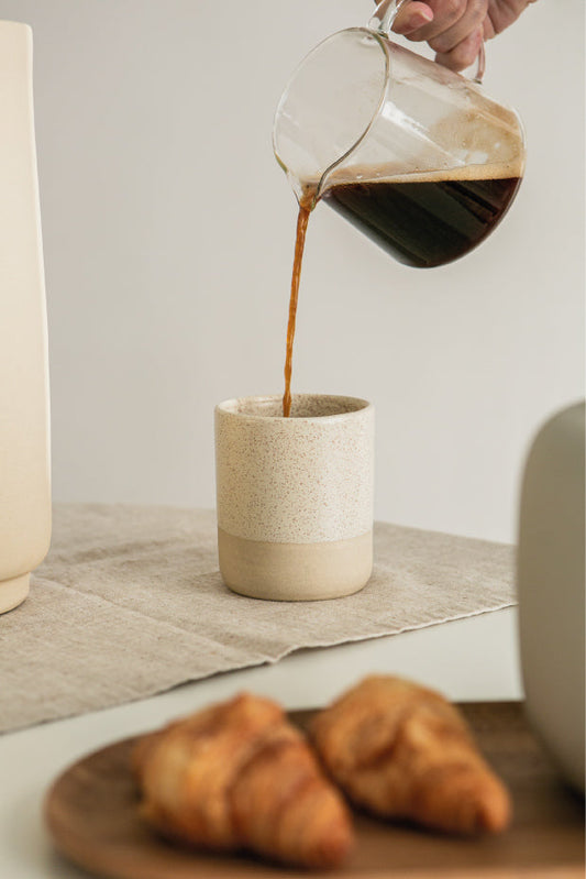 Ceramic cup designed for enjoying coffee, cappuccino, tea, and macchiato, featuring a comfortable handle and smooth finish for a cozy drinking experience.handmade in portugal