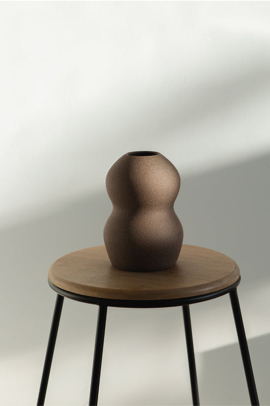 Palus in brown, ceramic vase with a textured, earthy surface, handmade in Portugal. Perfect for displaying flowers or as a unique decorative vase in modern interiors.